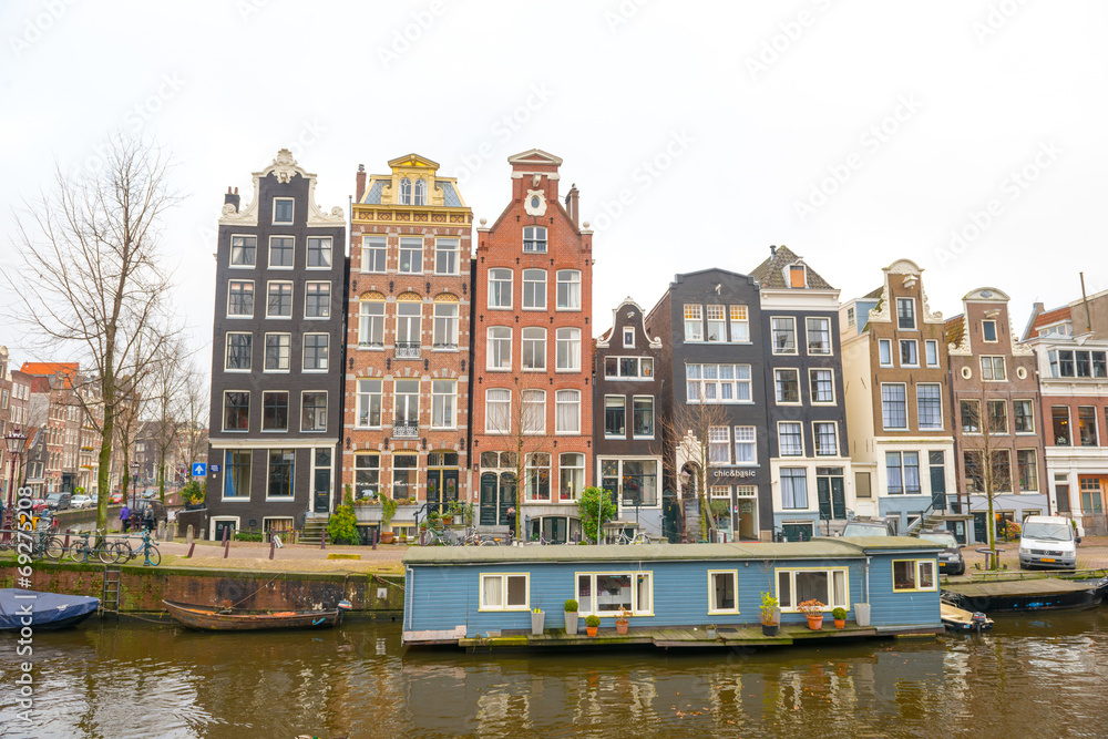 Dutch canals and typical canalside houses in Amsterdam