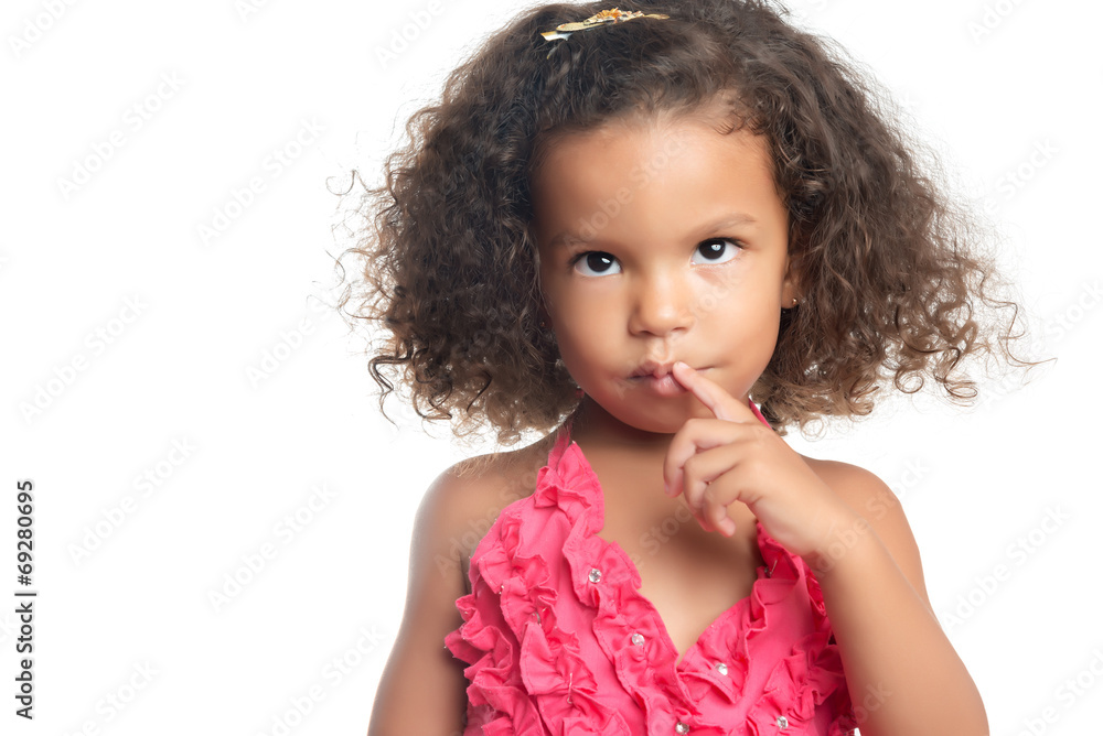 Lttle girl with an afro hairstyle with her arms extended Lttle girl with an afro hairstyle with her arms extended