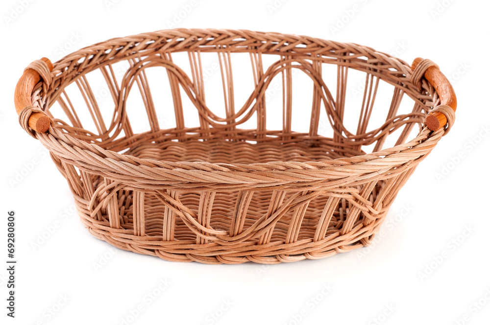 Obraz premium empty wicker basket isolated