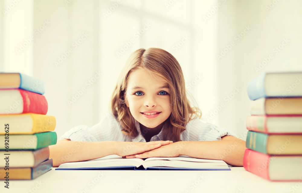 smiling little student girl with many books smiling little student girl with many books