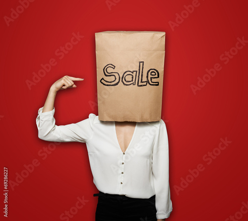 sale woman pointing