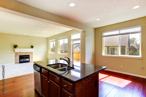 Modern kitchen island with granite top.