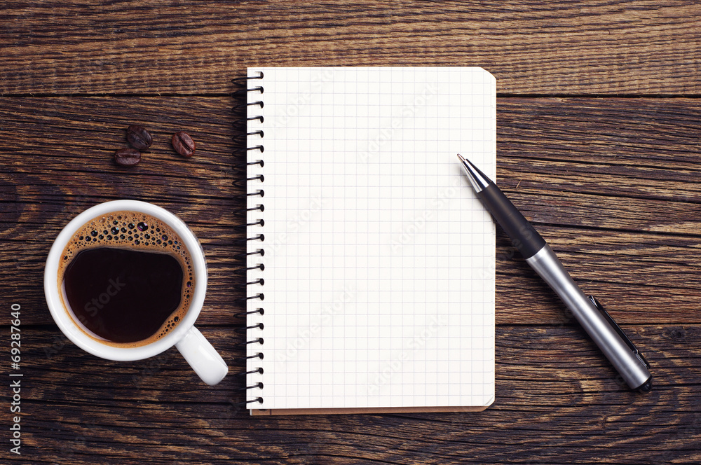 Cup of coffee and notepad - obrazy, fototapety, plakaty 