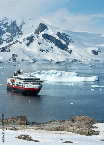 tourist ship that stands in the strait near the penguin colony