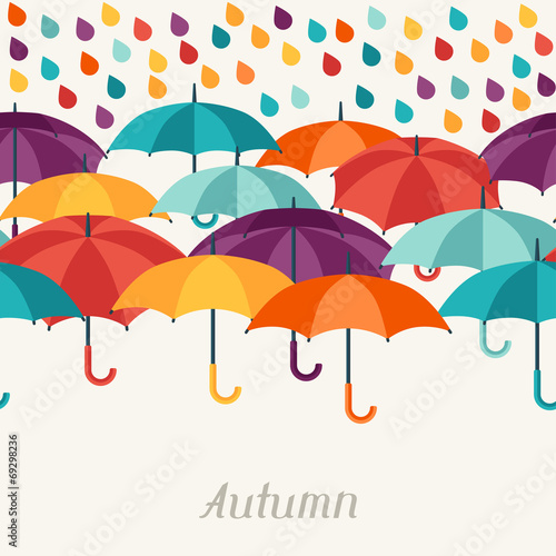 Autumn background with umbrellas in flat design style.