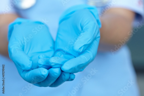 woman doctor in medical gloves
