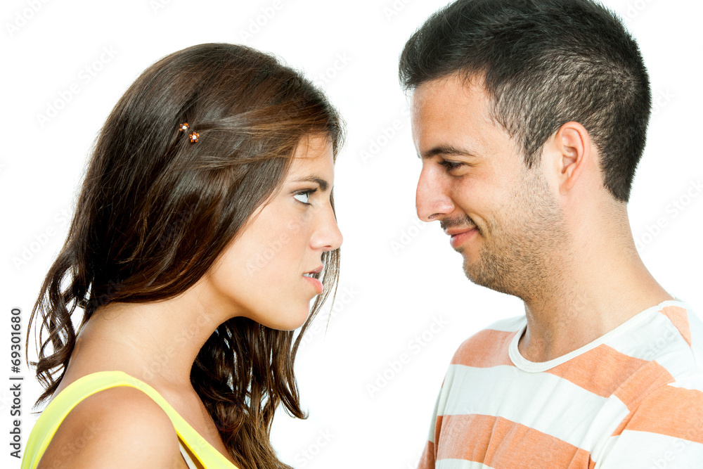Furious girl looking at boyfriend. Furious girl looking at boyfriend.