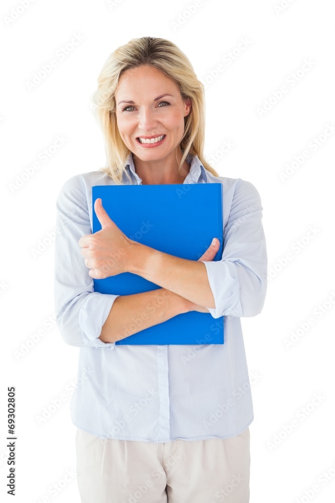 Happy blonde mature student holding folder Happy blonde mature student holding folder