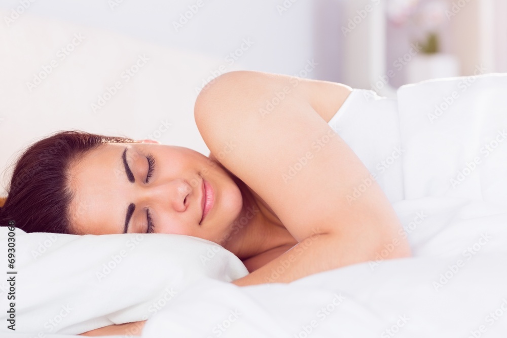 Relaxed beautiful woman sleeping in bed Relaxed beautiful woman sleeping in bed