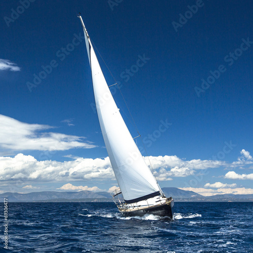 Sailing in the wind through the waves. Luxury yachts.. © De Visu