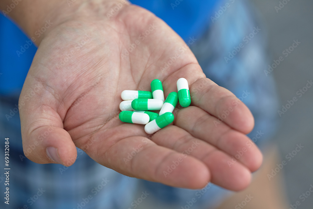 the doctor gave the patient medication capsules