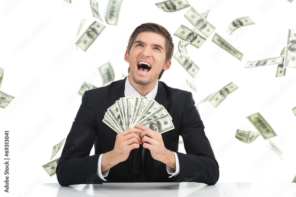 Business man holding dollar bills and yelling. Business man holding dollar bills and yelling.