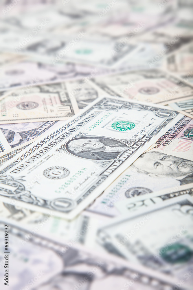 Dollar notes background concept tilt/shift blurred out Dollar notes background concept tilt/shift blurred out