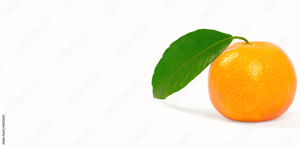 Tangerine with green leaves isolated on white Tangerine with green leaves isolated on white
