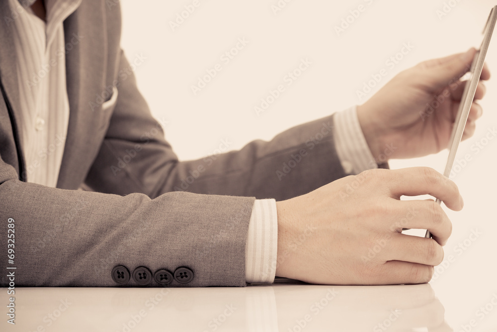 Fototapeta premium Businessman analyzing investment charts with laptop. Accounting