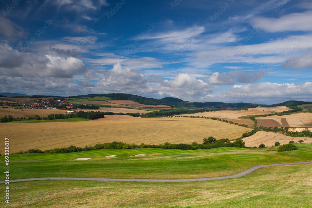 Golf course in autumn landscape