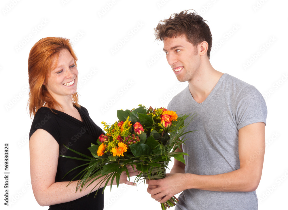 Man gives his girlfriend a beautiful bunch of flowers Man gives his girlfriend a beautiful bunch of flowers