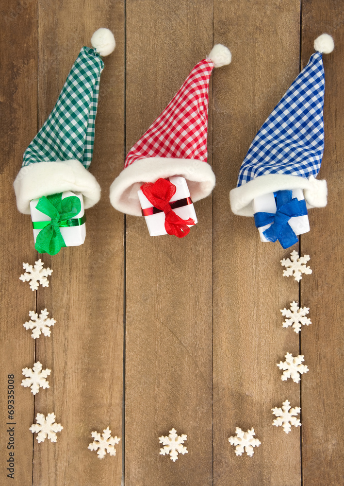 wooden background with chequered Christmas decoration wooden background with chequered Christmas decoration