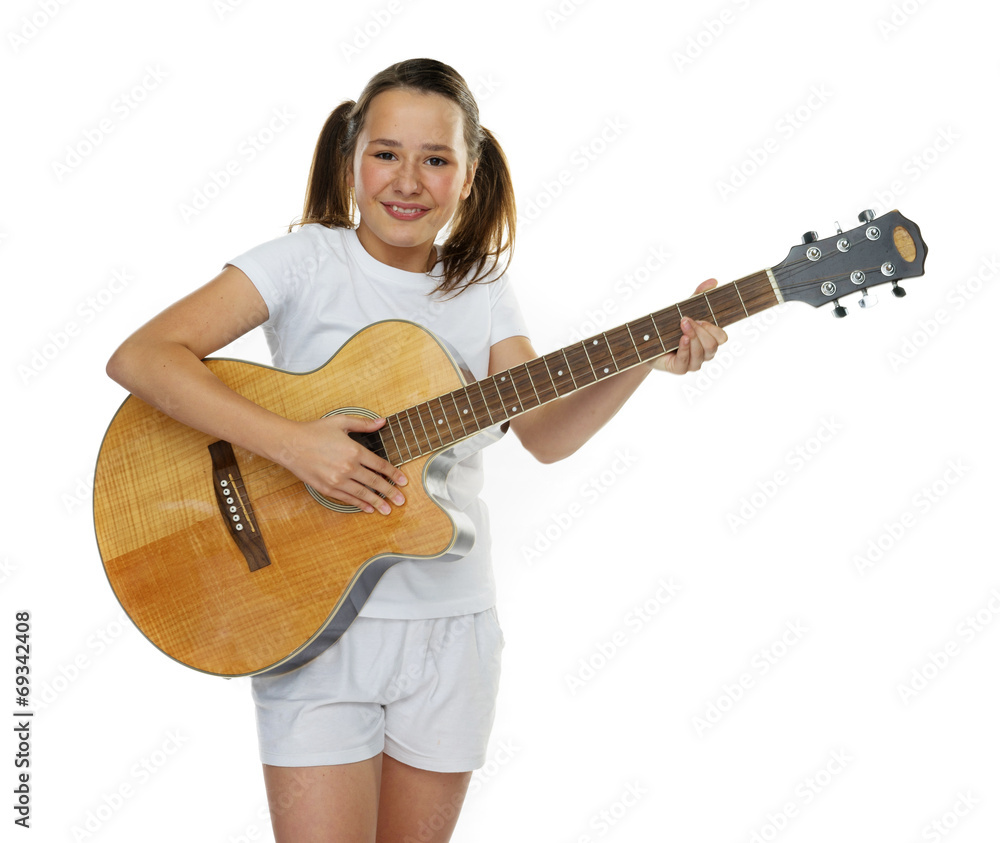 Young girl playing guitar Young girl playing guitar