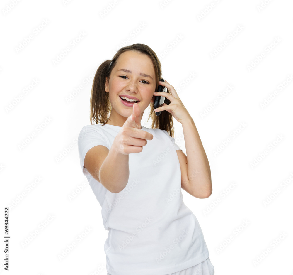 Laughing young girl giving a thumbs up gesture Laughing young girl giving a thumbs up gesture