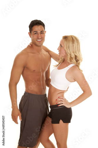 fitness couple white sports bra man no shirt