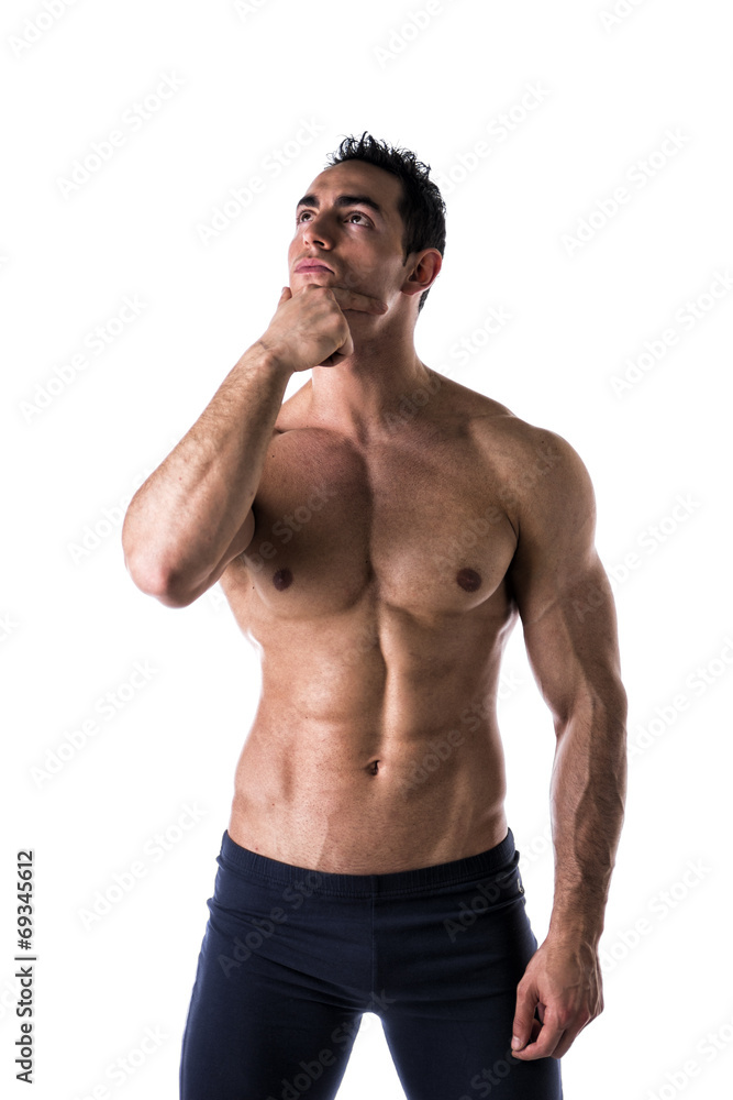 Wondering man with hand under his chin Wondering man with hand under his chin