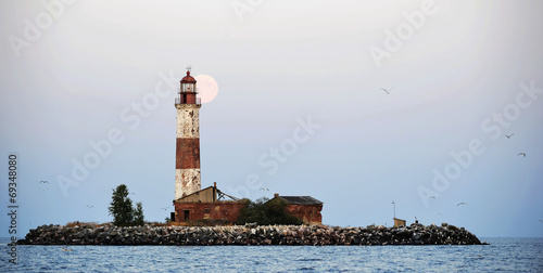 Moon and Old lighthouse