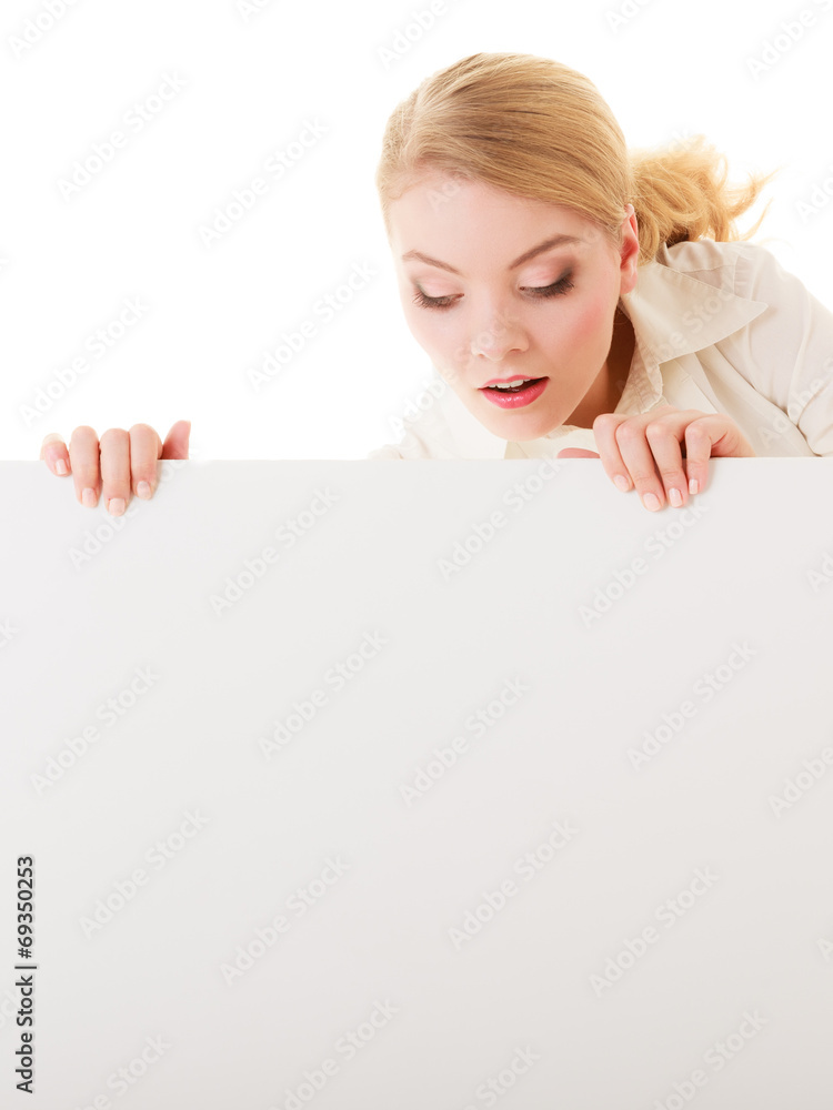Businesswoman hiding behind blank copy space banner Businesswoman hiding behind blank copy space banner