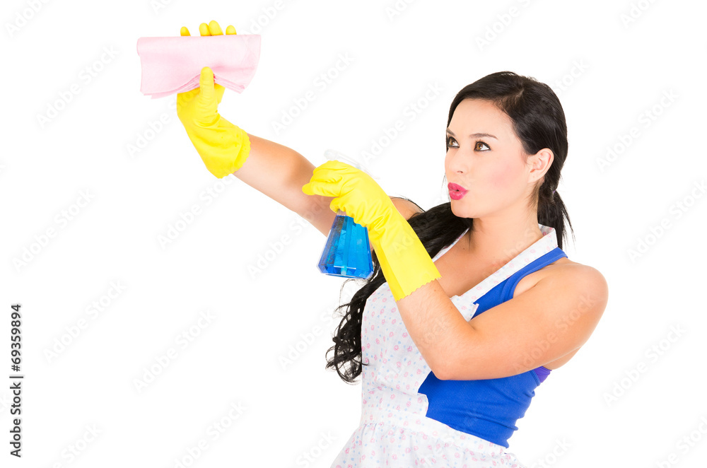 Beautiful young girl wearing apron and gloves cleaning Beautiful young girl wearing apron and gloves cleaning