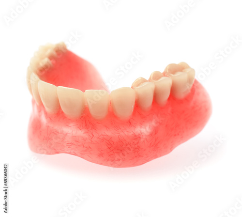 An upper denture placed on white background