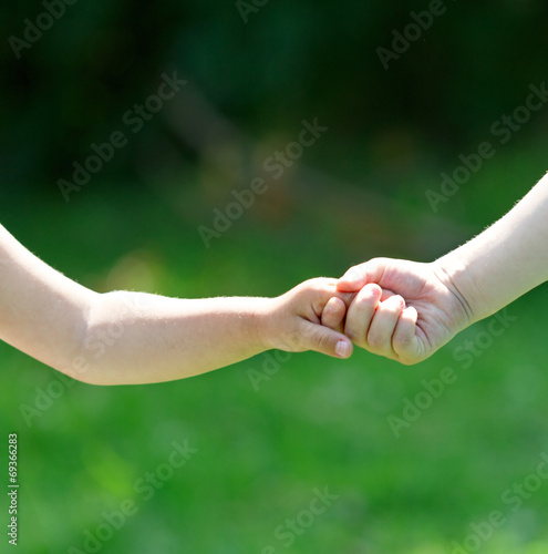 Children hand in hand © Sergey Yarochkin