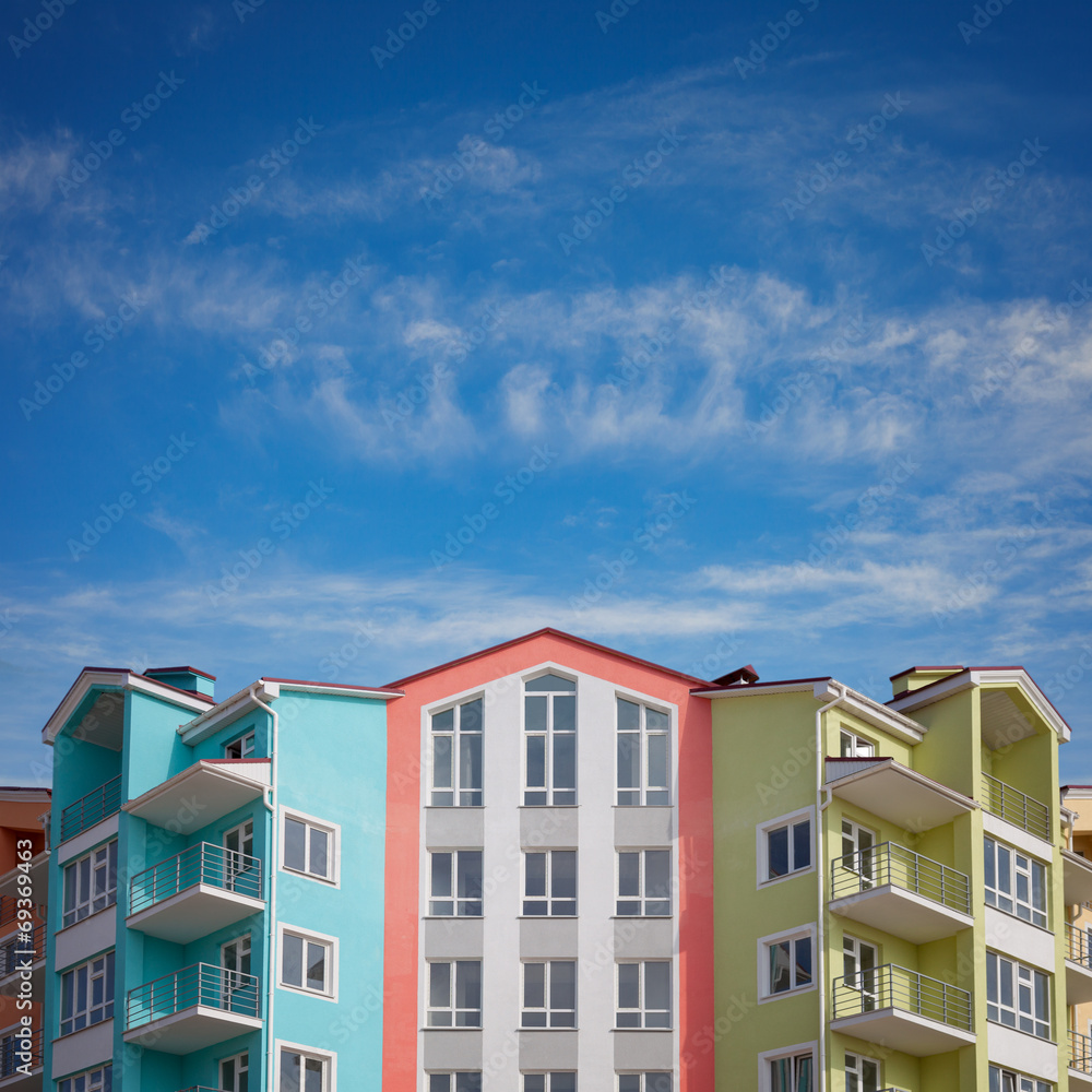 Colorful houses under a blue sky