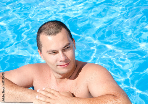 Young man in the swimming pool © svetamart