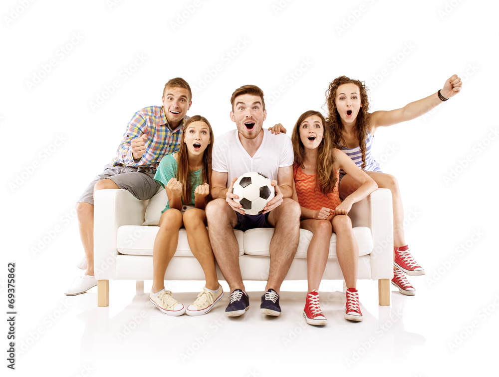 Obraz premium Group of young people on sofa with ball