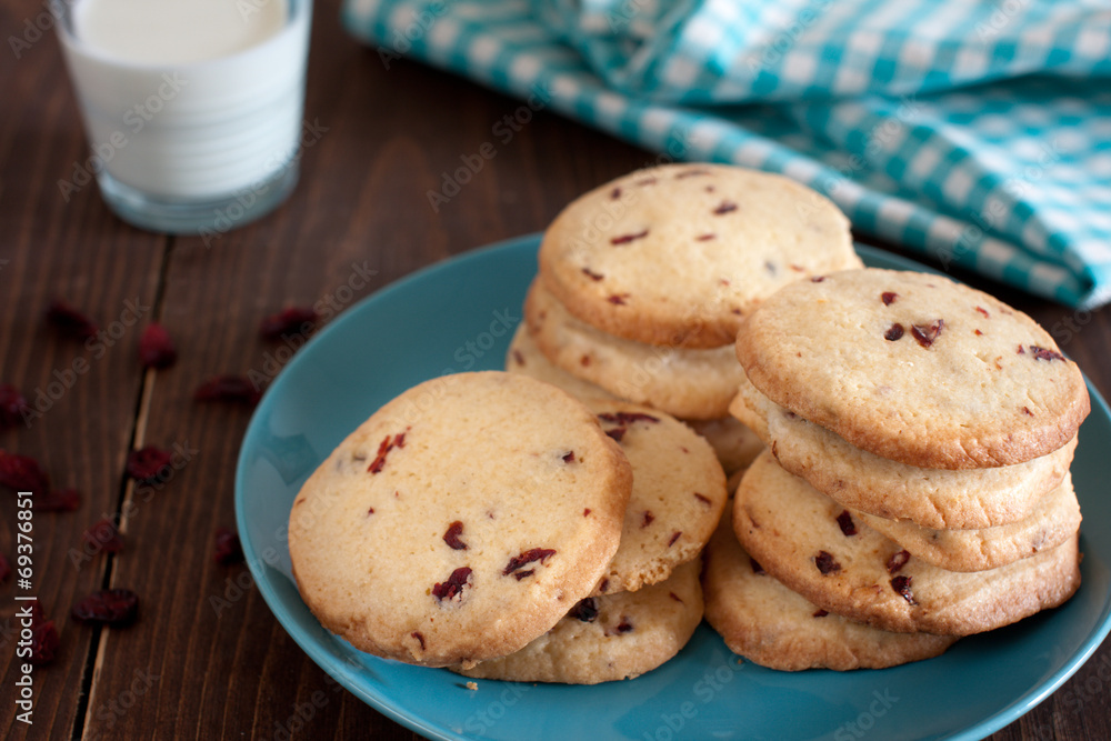 cookies with dry cranberries and a glass of milk cookies with dry cranberries and a glass of milk