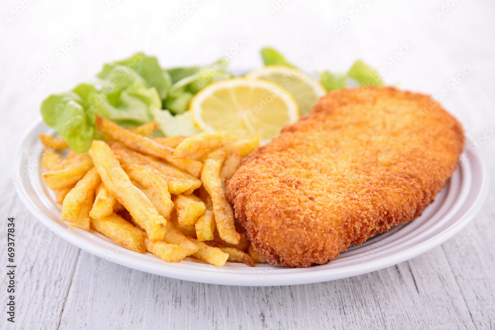 breaded meat and fries