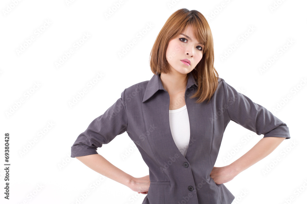 angry, serious, upset business woman with arms akimbo angry, serious, upset business woman with arms akimbo