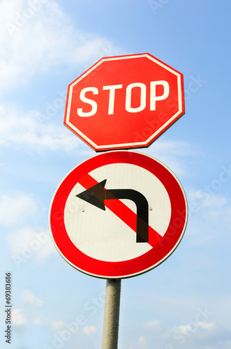 Stop and do not turn left signs