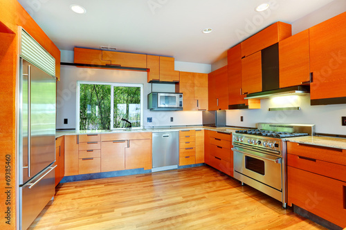 Modern bright orange kitchen room © Iriana Shiyan