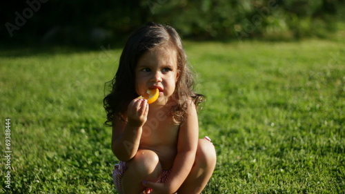 Beautiful child and green trees