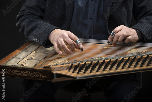 Qanun, a zither like instrument with seventy-eight strings photo