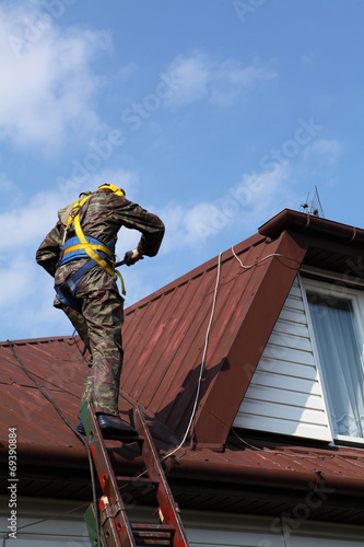 Construction worker on a roof
