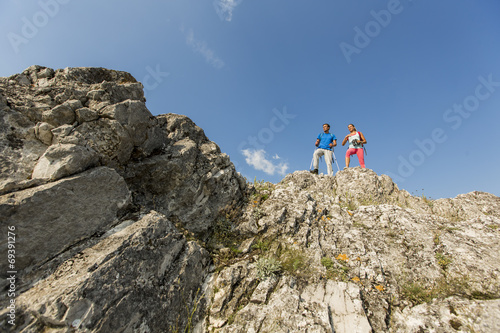 Young couple hiking on the ...