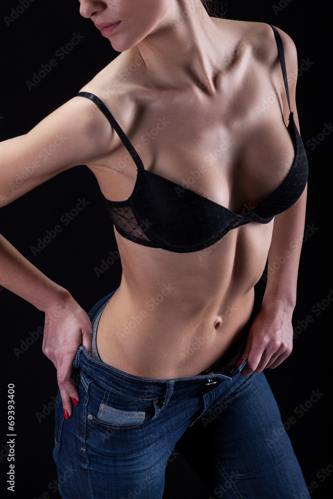 Hot sexy girl in bra and jeans Stock Photo | Adobe Stock