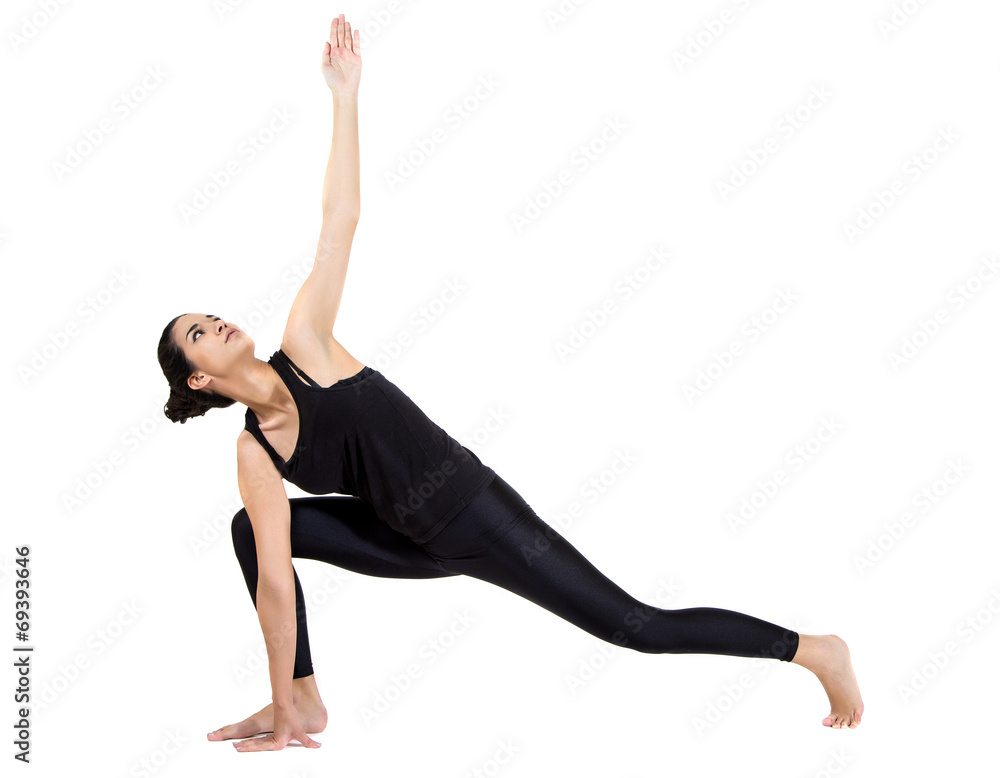 Pretty young woman training yoga