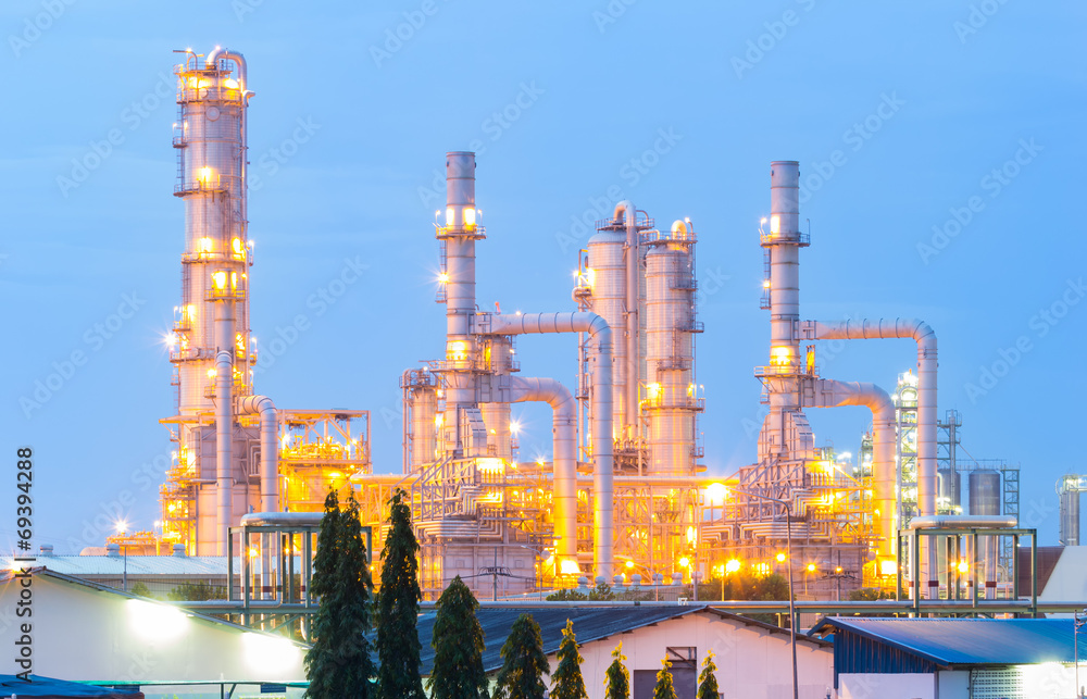 Obraz premium Oil gas refinery plant. May called petroleum, production or petrochemical plant. Industrial factory construction from engineering technology with steel pipe, pipeline, tank. Business for power energy.