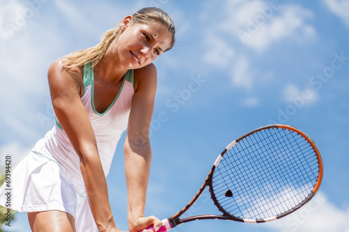 Young woman playing tennis