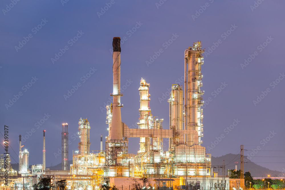 Obraz premium Oil gas refinery plant. May called petroleum, production or petrochemical plant. Industrial factory construction from engineering technology with steel pipe, pipeline, tank. Business for power energy.