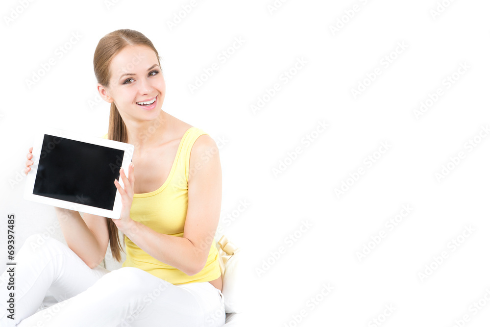 beautiful girl sitting and shows the electronic tablet beautiful girl sitting and shows the electronic tablet