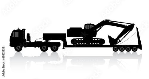 Silhouette of the excavator on the trawl.